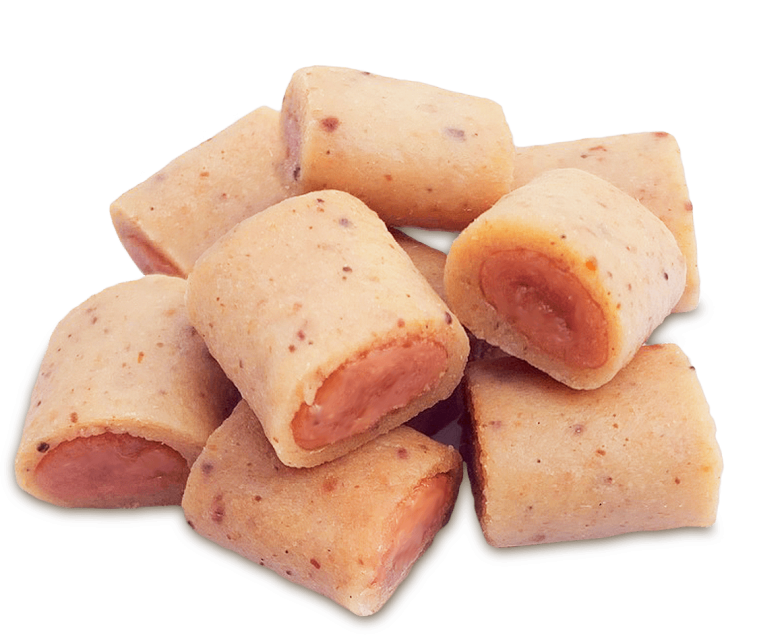 Nahaufnahme mehrerer mit Erdnussbutter gefüllter Teigrollen.